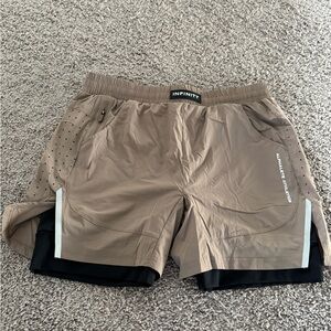 Alphalete Shorts
5” inch inseam 
Built in liner 
Size L